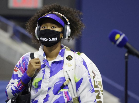 epa08660182 Naomi Osaka of Japan wears a Philando Castile mask as she arrives to play Jennifer Brady of the US in their Women&#039;s Semifinal match on the eleventh day of the US Open Tennis Champions ...