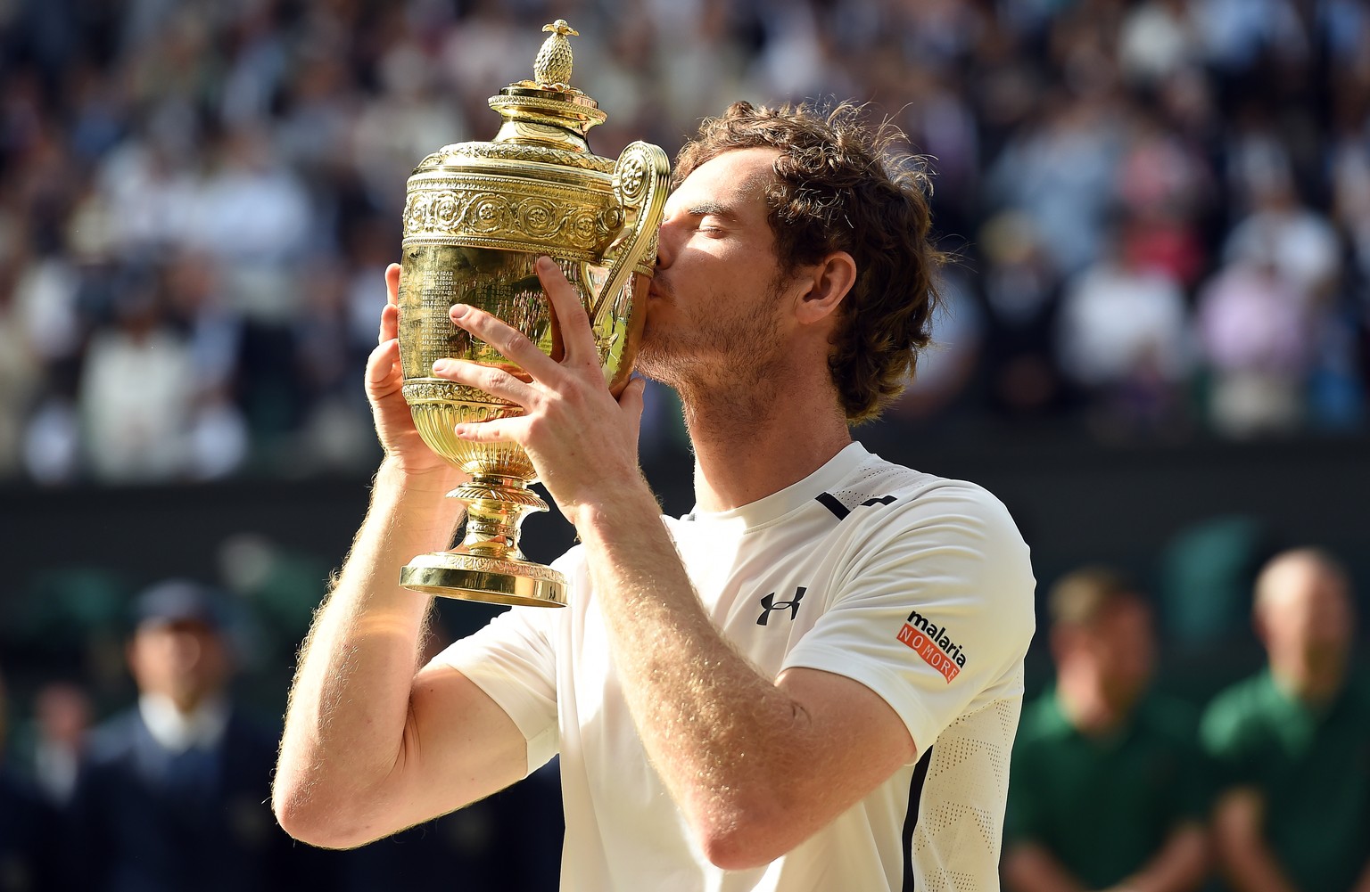 epa07274365 (FILE) - Andy Murray of Britain kisses the championship trophy following his win over Milos Raonic of Canada in the men&#039;s singles final of the Wimbledon Championships at the All Engla ...
