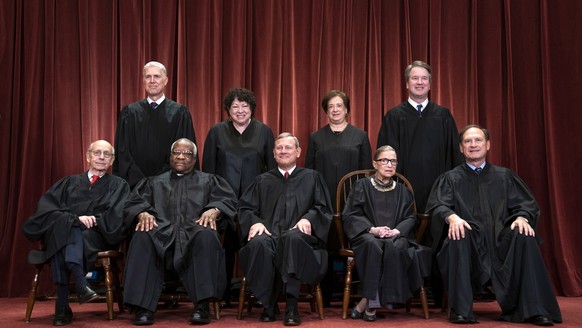 epa08679872 (FILE) - United States Chief Justice John G. Roberts (F-C), along with Supreme Court Associate Justices Stephen Breyer (F-L), Clarence Thomas (F-2-L), Ruth Bader Ginsburg (F-2-R), Samuel A ...