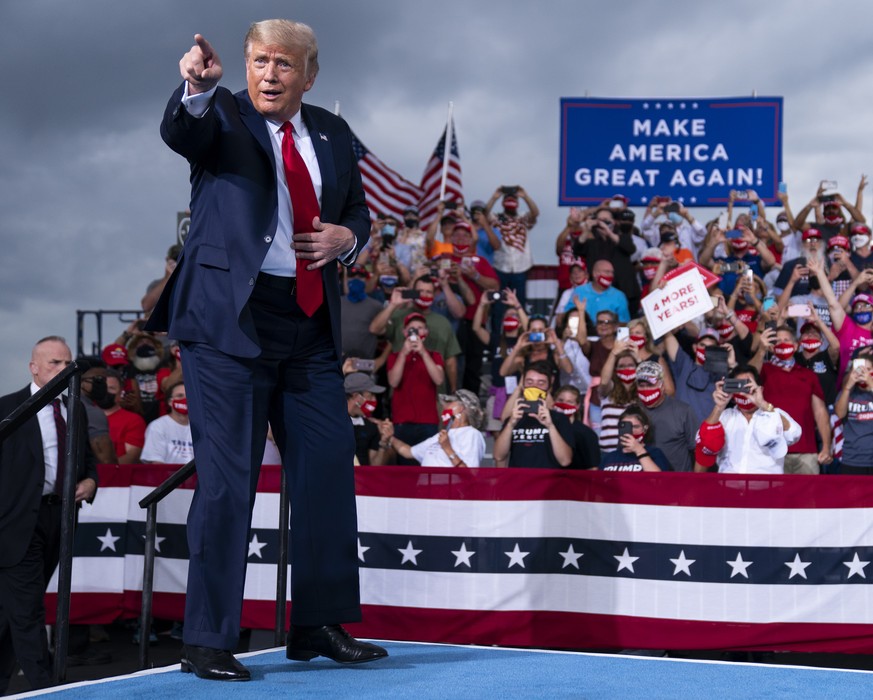 President Donald Trump arrives to speak at a campaign rally at Smith Reynolds Airport, Tuesday, Sept. 8, 2020, in Winston-Salem, N.C. (AP Photo/Evan Vucci)
Donald Trump