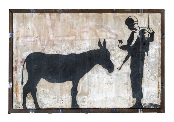 epa04946163 A handout picture provided by Julien&#039;s Auctions shows &#039;Donkey Document&#039; (2007) by Bansky, which will be auctioned as part of the Street Art featuring Banksy, at Julien&#039; ...