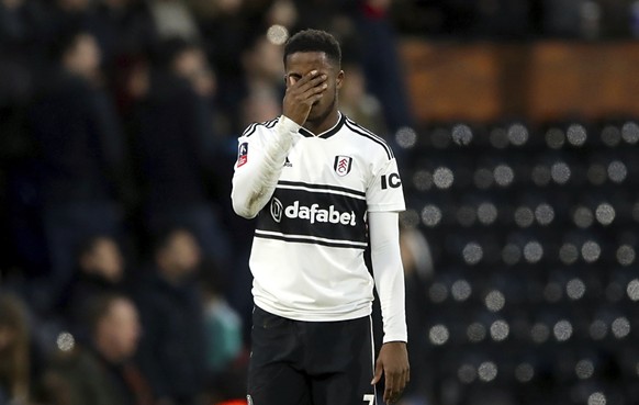 Fulham&#039;s Ryan Sessegnon shows his dejection after the final whistle of their English FA Cup, third round soccer match against Oldham Athletic at Craven Cottage, London, Sunday, Jan. 6, 2018. The  ...