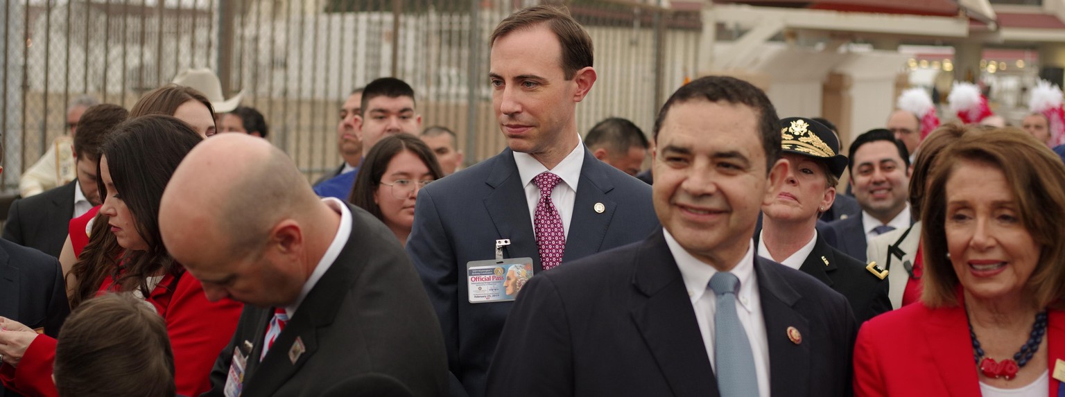 David Whitley, acting secretary of state of Texas, center, joins U.S. House Speaker Nancy Pelosi, a Democrat from California, right, and Representative Henry Cuellar, a Democrat from Texas, second rig ...