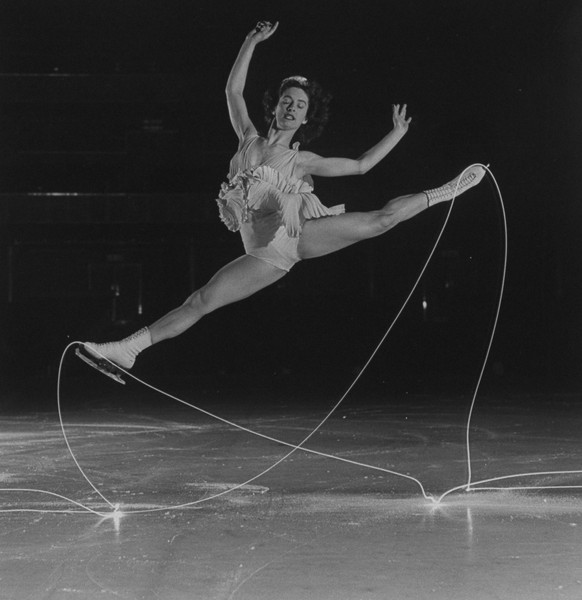 Figure skater Carol Lynne&#039;s movements are charted by flashlights imbedded in each boot while stroboscopic light stops her in mid-leap. (Photo by Gjon Mili/The LIFE Picture Collection via Getty Im ...
