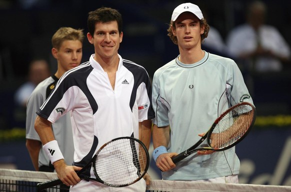 England&#039;s Tim Henman, left, and Andy Murray pose for the photopgraphers prior to their first round match at the Swiss Indoors tennis tournament in Basel, Switzerland, Wednesday October 26, 2005.  ...