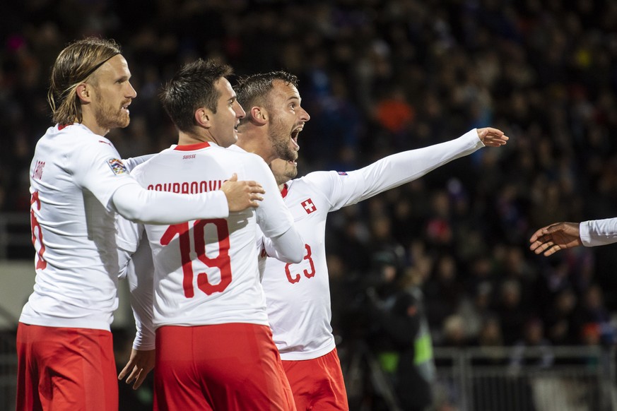 epa07095974 Switzerland&#039;s Haris Seferovic, (C), celebrate his goal during the UEFA Nations League soccer match between Iceland and Switzerland at the Laugardalsvoellur stadium in Reykjavik, Icela ...