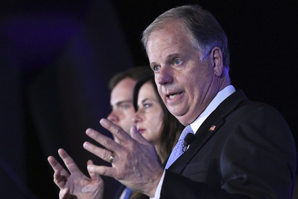 Sen. Doug Jones delivers his concession speech Tuesday, Nov. 3, 2020, during his election night watch party in Birmingham, Ala. Jones his seat to Republican Tommy Tuberville. (AP Photo/Julie Bennett)