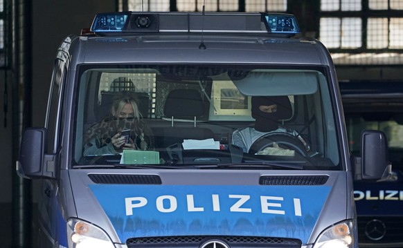 epa08364050 A police car leaves a police station in Karlsruhe, Germany, 15 April 2020. German federal police arrested five Tajik nationals, suspected members of a terrorist cell of the foreign terrori ...