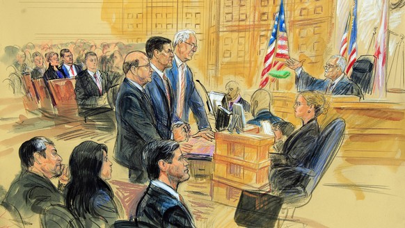 This courtroom sketch depicts former President Donald Trump&#039;s former national security adviser Michael Flynn, standing center, flanked by his lawyers, listening to U.S. District Judge Emmet Sulli ...