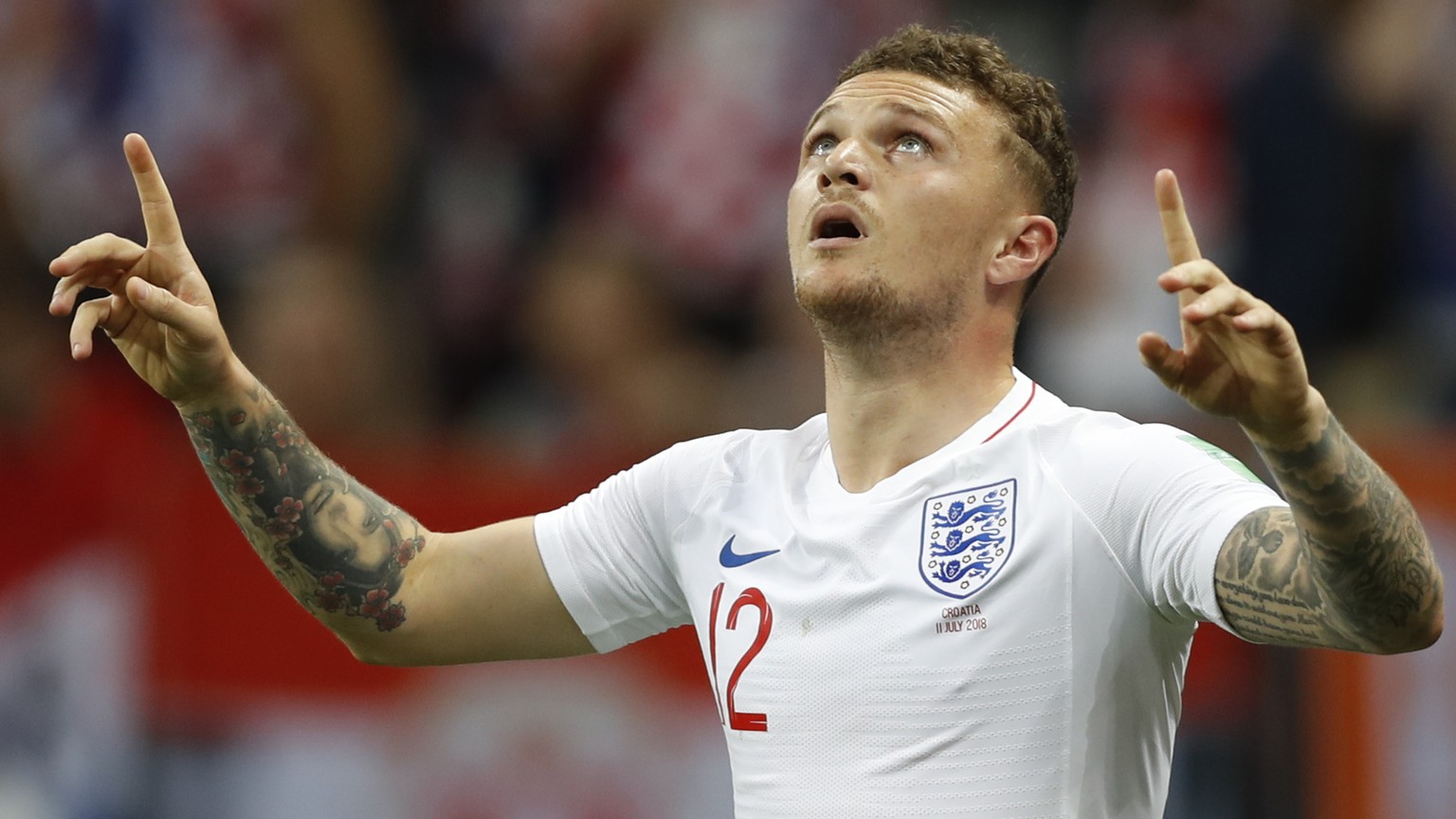 England&#039;s Kieran Trippier celebrates after scoring the opening goal during the semifinal match between Croatia and England at the 2018 soccer World Cup in the Luzhniki Stadium in Moscow, Russia,  ...