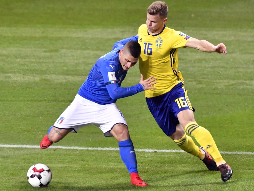 Italy&#039;s Marco Verratti, left, and Sweden&#039;s Emil Krafth battle for the ball during the World Cup qualifying play-off first leg soccer match between Sweden and Italy, at the Friends Arena in S ...