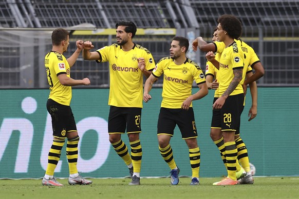 Emre Can of Borussia Dortmund celebrates scoring his teams first goal of the game with team mates during the German Bundesliga soccer match between Borussia Dortmund and Hertha BSC Berlin in Dortmund  ...