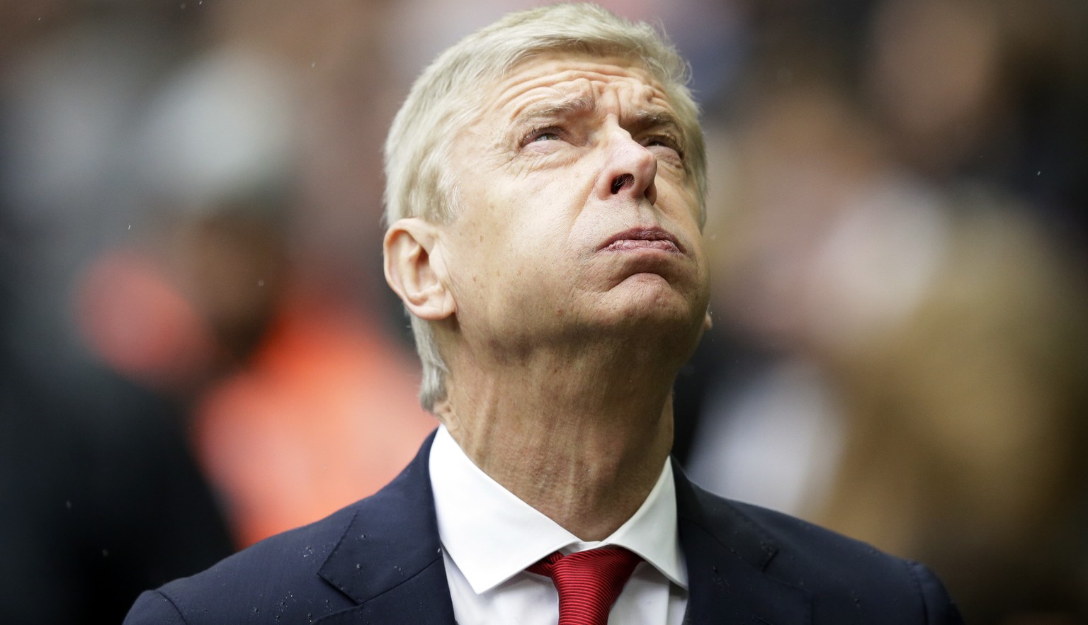 FILE - In this Saturday, Feb. 10, 2018 file photo, Arsenal&#039;s manager Arsene Wenger looks on before their English Premier League soccer match against Tottenham Hotspur at Wembley Stadium, London.  ...