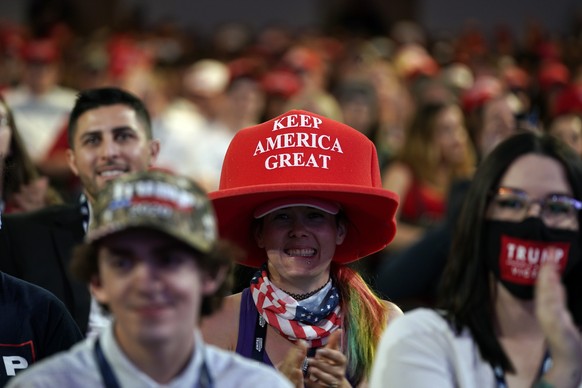Attendees wait for President Donald Trump to arrive and speak to a group of young Republicans at Dream City Church, Tuesday, June 23, 2020, in Phoenix. (AP Photo/Evan Vucci)
Donald Trump