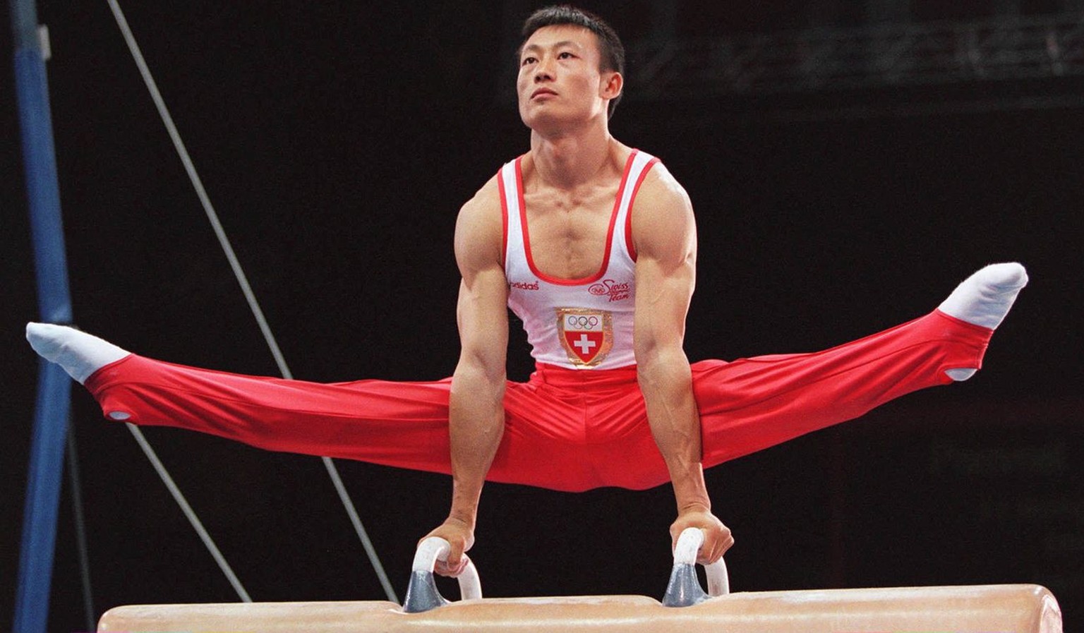 Donghua Li from Switzerland performs on the pommel horse during a gala show at the Georgia Dome in Atlanta, Georgia, 30 July 1996 Chinese-born Li Donghua became the first Swiss in 40 years to win a gy ...