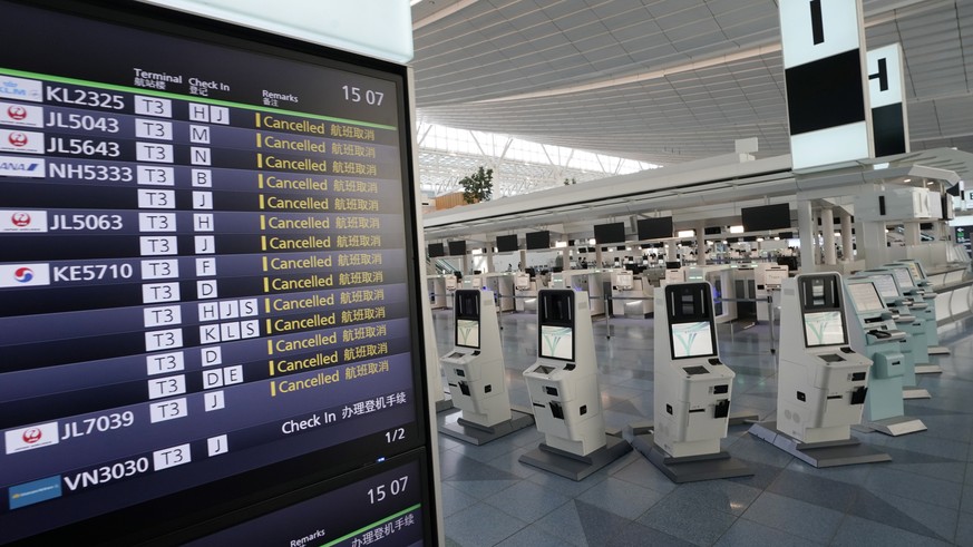 epa08340276 Departure flight information display shows cancellation of flights at Tokyo International Airport at Haneda in Tokyo, Japan, 03 April 2020. Japanese government announced on 01 April 2020 i ...
