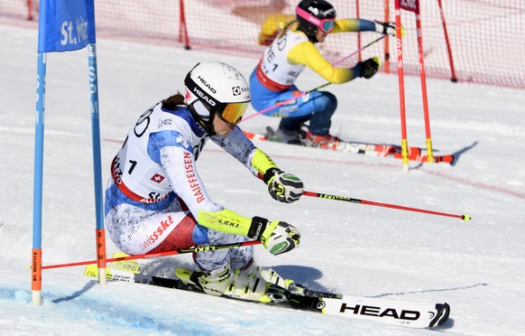 SwitzerlandÕs Wendy Holdener, left, in action against Sweden&#039;s Frida Hansdotter, right, during the final for the 3rd place of the Nations Team Event at the 2017 FIS Alpine Skiing World Championsh ...
