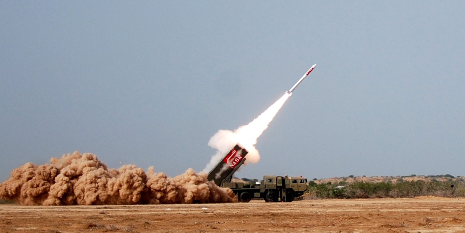epa04418110 A handout picture released by the Pakistan Armed Forces Inter-Services Public Relations (ISPR) on 26 September 2014 shows the test launch of a short range surface-to-surface Missile Hatf I ...