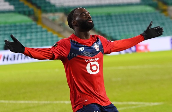 epa08876250 Jonathan Ikone of Lille celebrates after scoring the opening goal during the UEFA Europa League group H soccer match between Celtic Glasgow vs OSC Lille in Glasgow, Britain, 10 December 20 ...