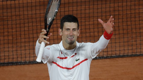Serbia&#039;s Novak Djokovic celebrate winning his third round match of the French Open tennis tournament against Colombia&#039;s Daniel Elahi Galan in three sets 6-0, 6-3, 6-3, at the Roland Garros s ...