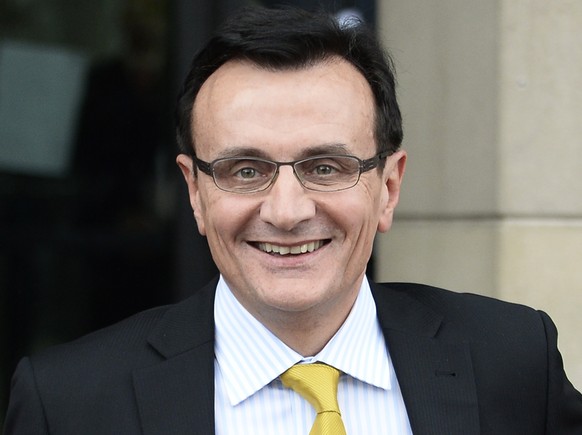 epa08968560 (FILE) - Pascal Soriot (C), Chief Executive of AstraZeneca, leaves Portcullis House in London, Britain, 13 May 2014 (reissued 27 January 2021). AstraZeneca has rejected EU&#039;s criticism ...