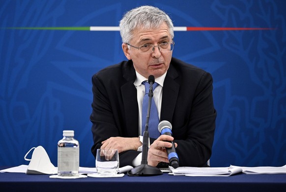 epa09084470 Italian Minister of Economy Daniele Franco speaks at a press conference after a cabinet meeting, in Rome, Italy, 19 March 2021, during which Prime Minister Draghi explained the government& ...