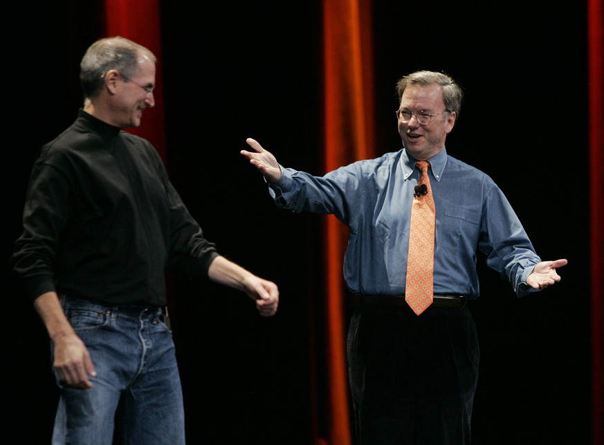 Apple CEO Steve Jobs, left, and Google CEO Eric Schmidt, right, smile as they introduce the iPhone during Jobs&#039; keynote address at MacWorld Conference &amp; Expo in San Francisco, Tuesday, Jan. 9 ...