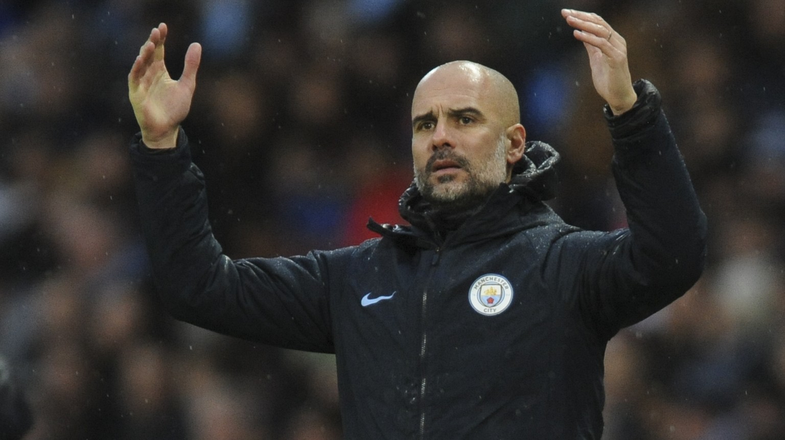 Manchester City manager Josep Guardiola reacts during the FA Cup 4th round soccer match between Manchester City and Burnley at Etihad stadium in Manchester, England, Saturday, Jan. 26, 2019. (AP Photo ...