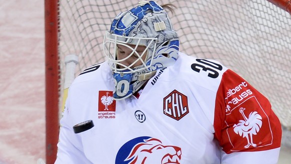 epa04436271 Goalkeeper Lukas Flueler of ZSC Lions Zurich in action during the Champions Hockey League group B match between Vienna Capitals and ZSC Lions Zurich in Vienna, Austria, 7 October 2014. EPA ...