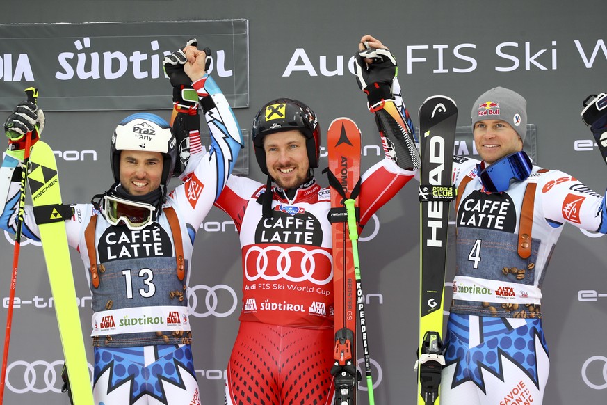 From left, second placed Thomas Fanara of France, winner Marcel Hirscher of Austria and third placed Alexis Pinturault of France celebrate on the podium of a men&#039;s World Cup Giant Slalom, in Alta ...