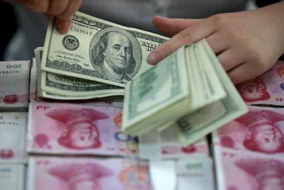 Aneinander gekettet: Der Dollar und der Renminbi.