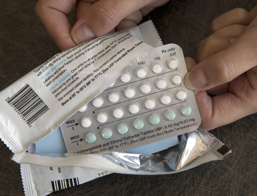 FILE - In this Aug. 26, 2016, file photo, a one-month dosage of hormonal birth control pills is displayed in Sacramento, Calif. A U.S. judge will hear arguments over California’s attempt to block new  ...