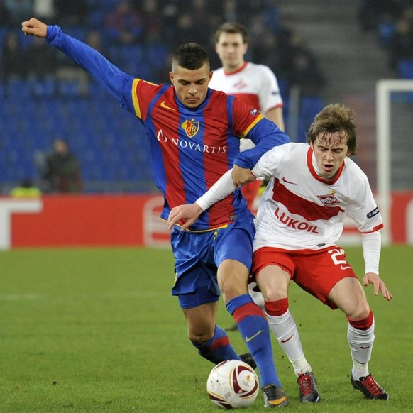 Basel&#039;s Granit Xhaka, left, fights for the ball against Moscow&#039;s Jano Ananidze, right, during the UEFA Europa League round of 32 first leg soccer match between Switzerland&#039;s FC Basel an ...