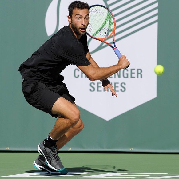 NEWPORT BEACH, CA - JANUARY 26: Noah Rubin (USA) chases after the ball during the second set of a quarterfinal match against Taylor Fritz (USA) during the Oracle Challenger Series played on January 26 ...
