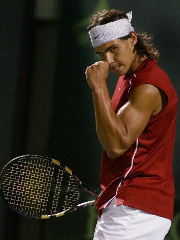 Rafael Nadal of Spain celebrates after winning a point against Roger Federer of Switzerland Sunday, March 28, 2004, at the Nasdaq-100 Open in Key Biscayne, Fla. Thirty-second seeded Nadal went on to d ...