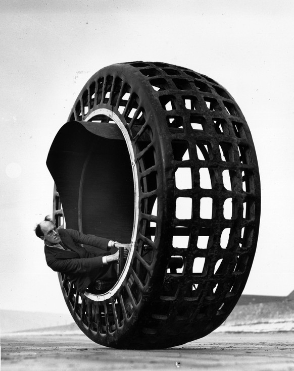 The Dynasphere, an electrically-driven wheel, capable of speeds of 30mph, being tested on the beach at Weston Super Mare by Mr J. A. Purves of Taunton, who invented the machine with his son. (Photo by ...