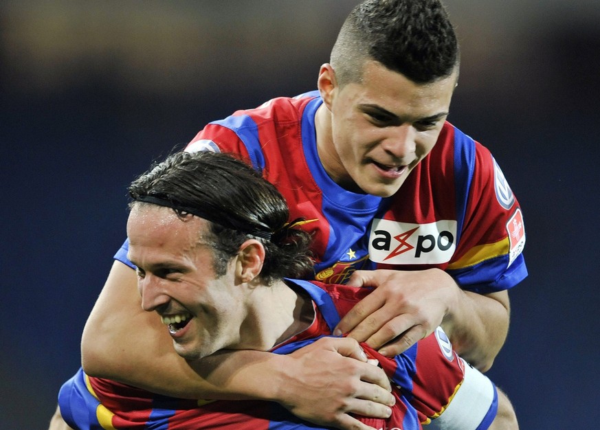 Basel&#039;s Marco Streller, front, and Granit Xhaka, back, cheer after scoring during the Super League soccer match between FC Basel and Servette FC at the St. Jakob-Park stadium in Basel, Switzerlan ...