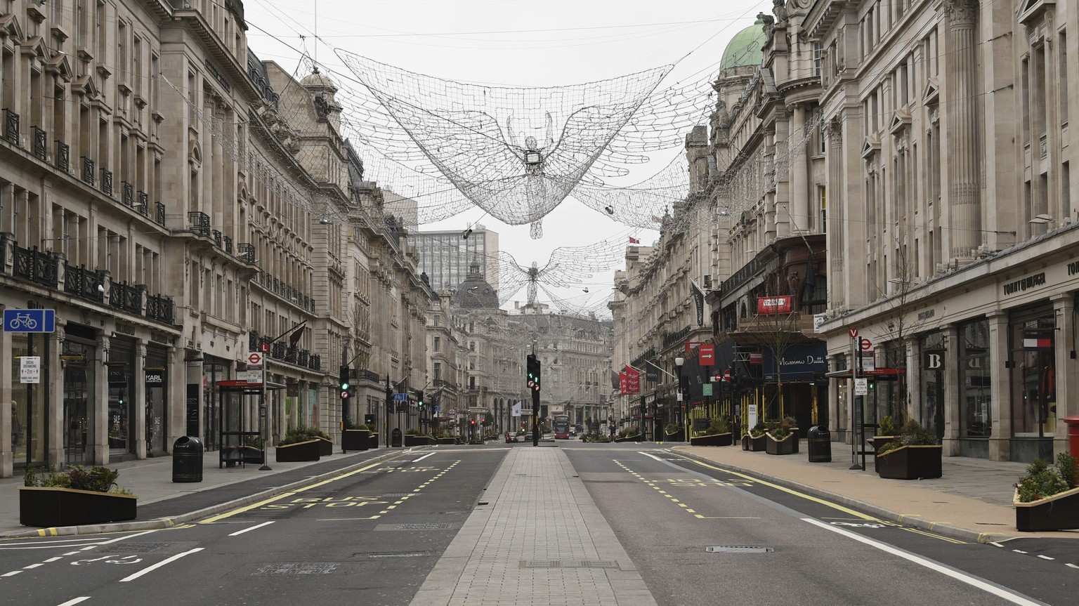 A view of an empty Regent Street, during what would normally be the Boxing Day sales. Boxing Day spending is expected to fall by more than a quarter compared with a year ago, after extensive new COVID ...
