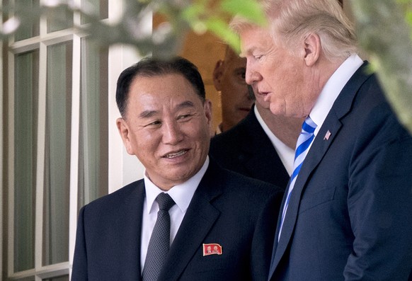 FILE - In this June 1, 2018, file photo, U.S. President Donald Trump, right, talks with Kim Yong Chol, former North Korean military intelligence chief and one of leader Kim Jong Un&#039;s closest aide ...