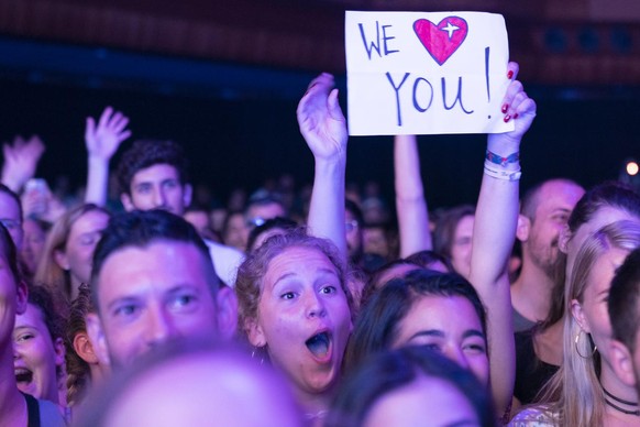 Festival goers cheer as US singer Lizzo performing on the stage of the Auditorium Stravinski during the 53rd Montreux Jazz Festival (MJF), in Montreux, Switzerland, Thursday, July 11, 2019. The MJF ru ...