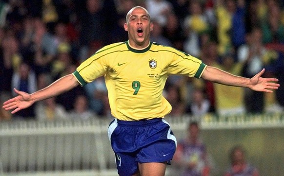Brazil&#039;s Ronaldo celebrates after scoring hids sides 4th goal during the soccer World Cup 98 second round match between Brazil and Chile at the Parc des Princes in Paris Saturday June 27, 1998. ( ...