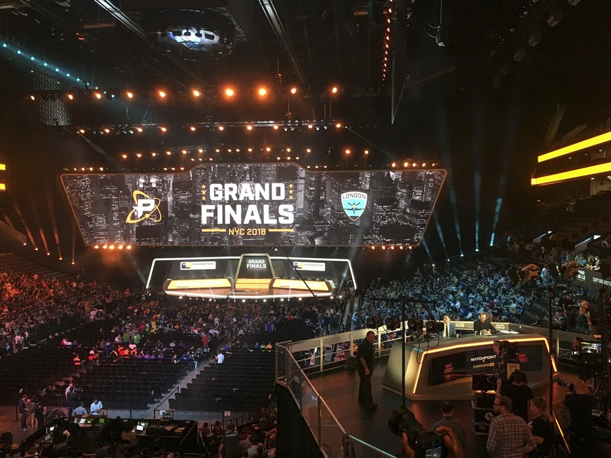 In this Friday, July 27, 2018, fans fill the arena as the stage is set for the Overwatch League Grand Finals&#039; first night of competition, at the Barclays Center in the Brooklyn borough of New Yor ...