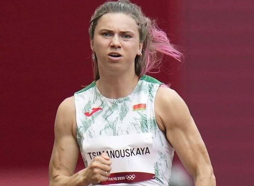 Tokyo Olympics: Asylum Photo shows Krystsina Tsimanouskaya of Belarus competing in the preliminary round of the women s 100-meters at the Tokyo Olympics on July 30, 2021, at the National Stadium. She  ...