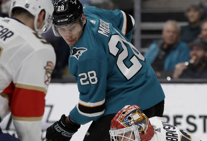 Florida Panthers&#039; Sergei Bobrovsky, right, blocks a shot from San Jose Sharks&#039; Timo Meier (28) in the third period of an NHL hockey game Monday, Feb. 17, 2020, in San Jose, Calif. (AP Photo/ ...