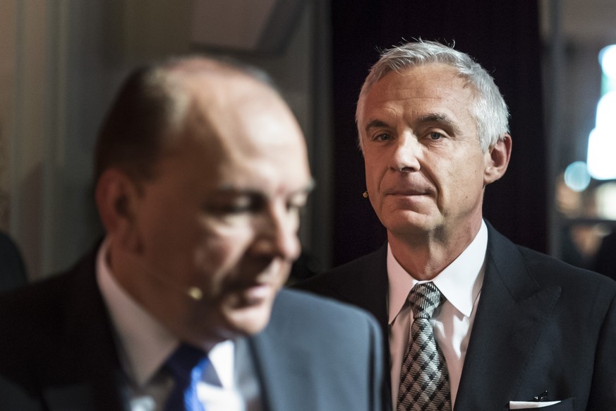 Urs Rohner, Chairman of Swiss Bank Credit Suisse, right, and Axel Weber, Chairman of Swiss Bank UBS, walk to a panel session during the Swiss International Finance Forum, in Bern, Switzerland, Tuesday ...