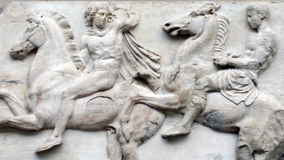 epa04450799 View at a sculpture of &#039;The Parthenon Marbles&#039; collection, also known as the &#039;Elgin Marbles&#039;, at the British Museum in London, Britain, 17 October 2014. Amal Alamuddin- ...