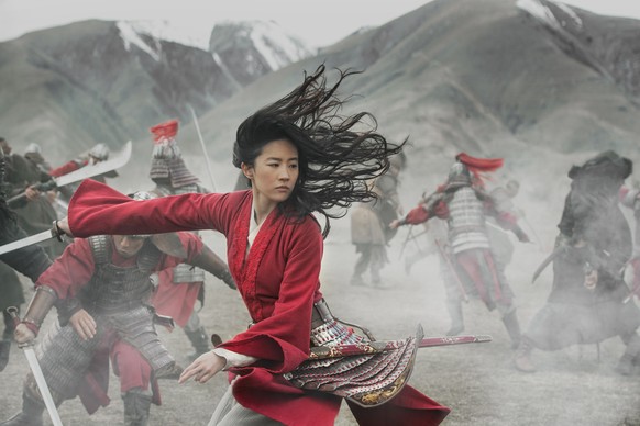 This image released by Disney shows Yifei Liu in the title role of &quot;Mulan.&quot; Last month, Walt Disney Co. experimented with the $200 million &quot;Mulan&quot; as a $30 premium buy on its fast- ...