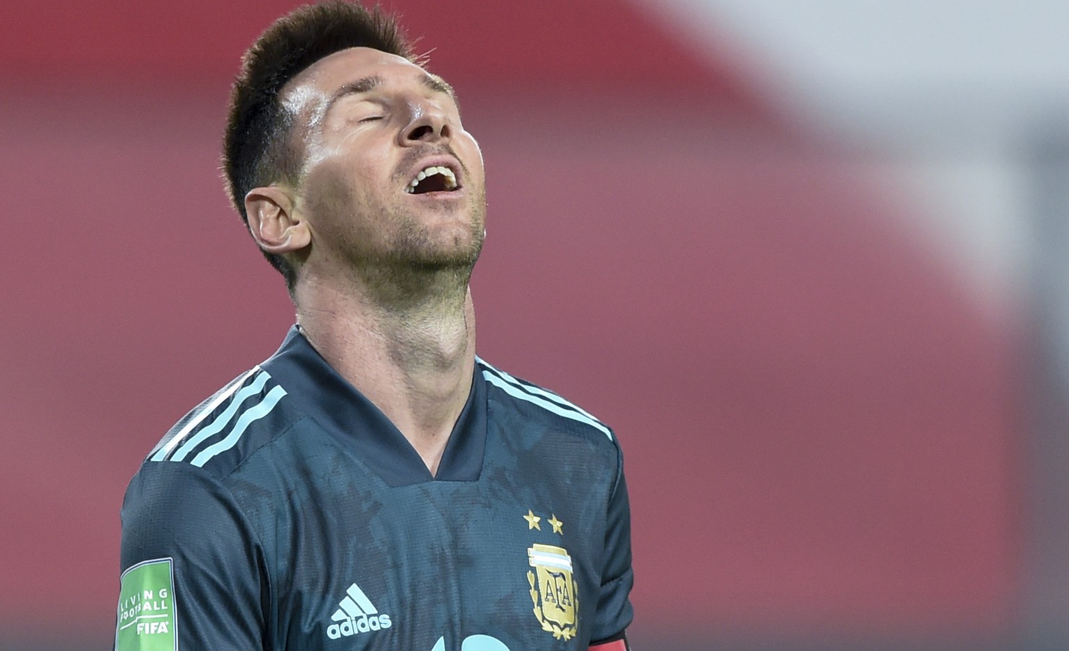 Argentina&#039;s Lionel Messi reacts during a qualifying soccer match against Peru for the FIFA World Cup Qatar 2022 in Lima, Peru, Tuesday, Nov. 17, 2020. (Ernesto Benavides, Pool via AP)