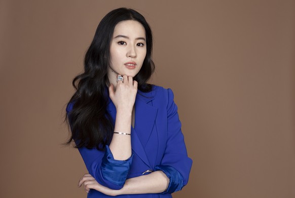 In this Sunday, March 8, 2020 photo, Yifei Liu, a cast member in the film &quot;Mulan,&quot; poses for a portrait in Los Angeles. (Photo by Rebecca Cabage/Invision/AP)
Yifei Liu