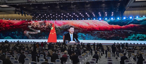 epa08836721 Chinese President Xi Jinping delivers an address over video to attendees before the opening ceremony of World Internet Conference in Wuzhen, Zhejiang Province, China, 23 November 2020. The ...